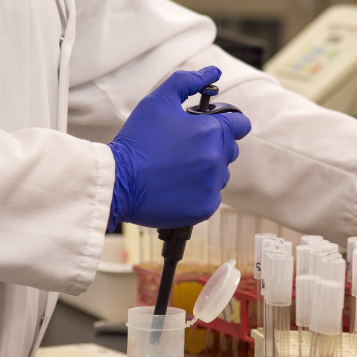 Laboratory Technician in Indigo Exam Gloves